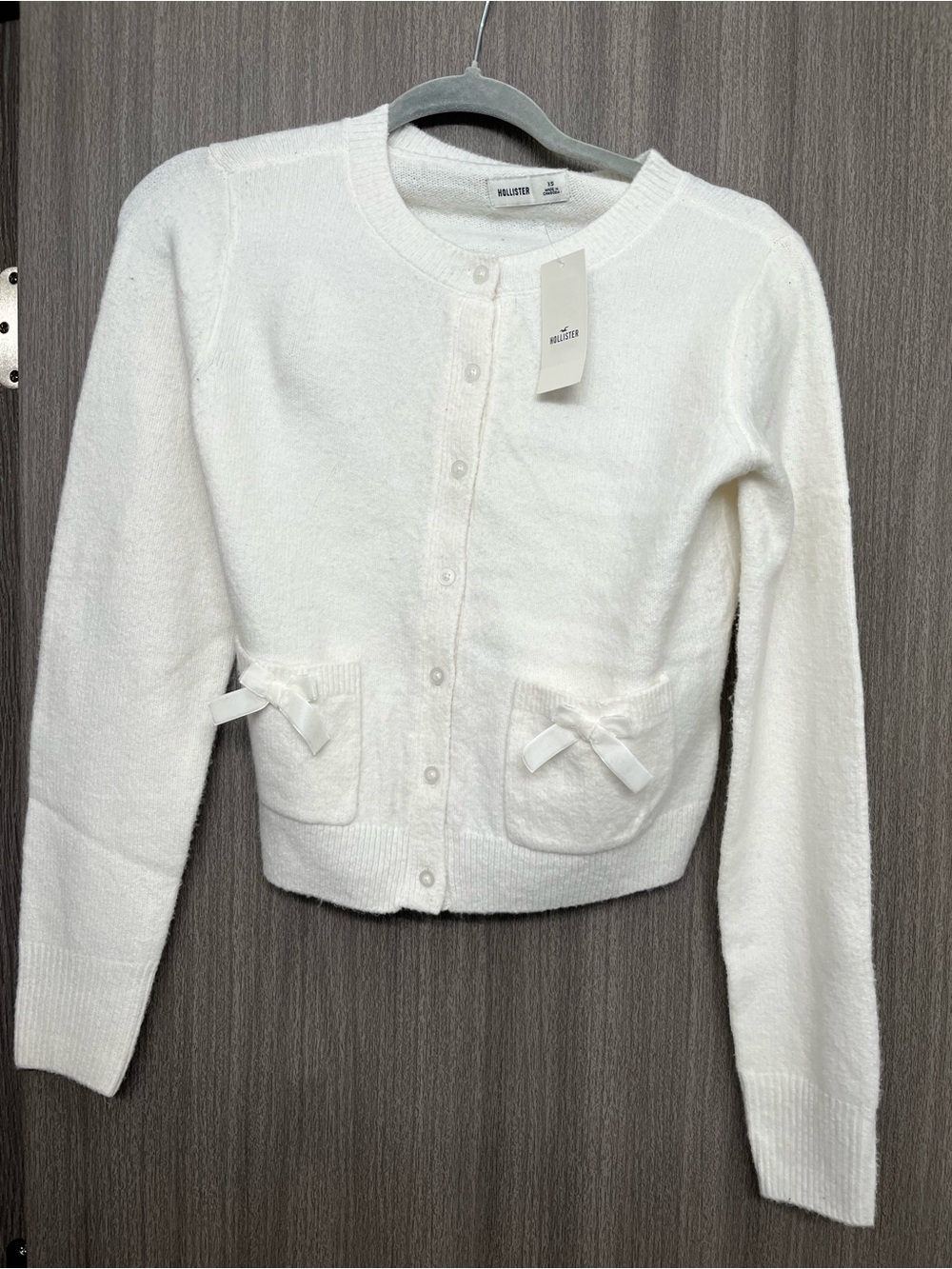 Hollister Women's Cream Button-Up Pocket Cardigan with Bow Accents